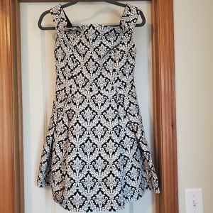 Off the shoulder, just above knee